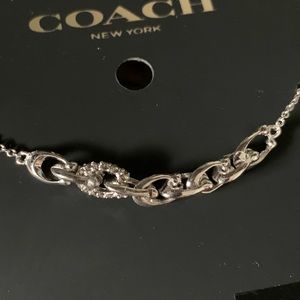 Coach Linked Signature Slider Bracelet